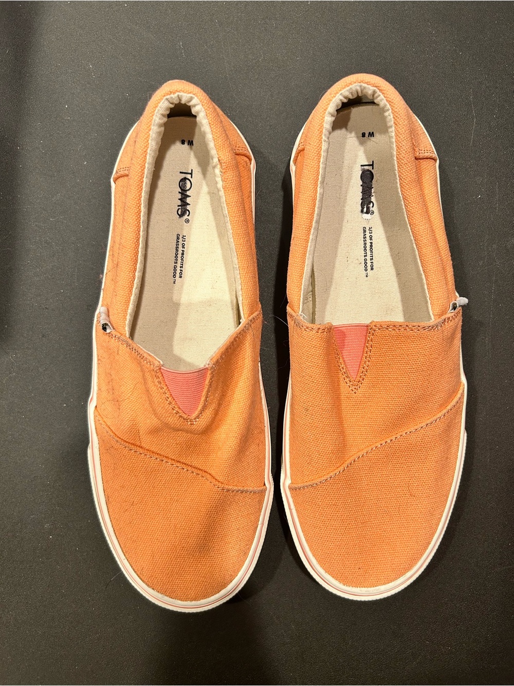 TOMS Woman’s Orange Canvas Slip-On Loafers